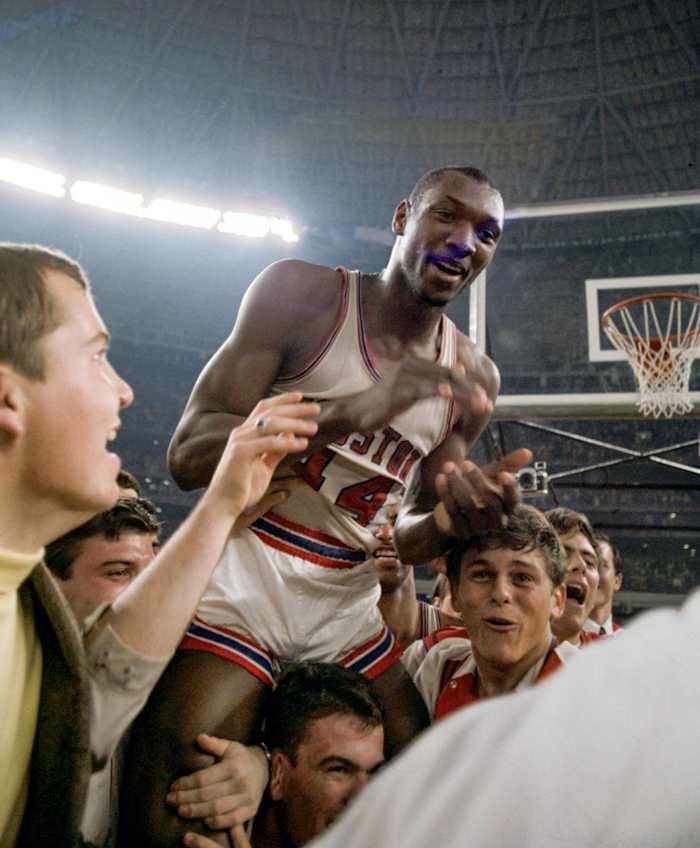 Elvin Hayes is carried off the Astrodome court after Houston beat UCLA.